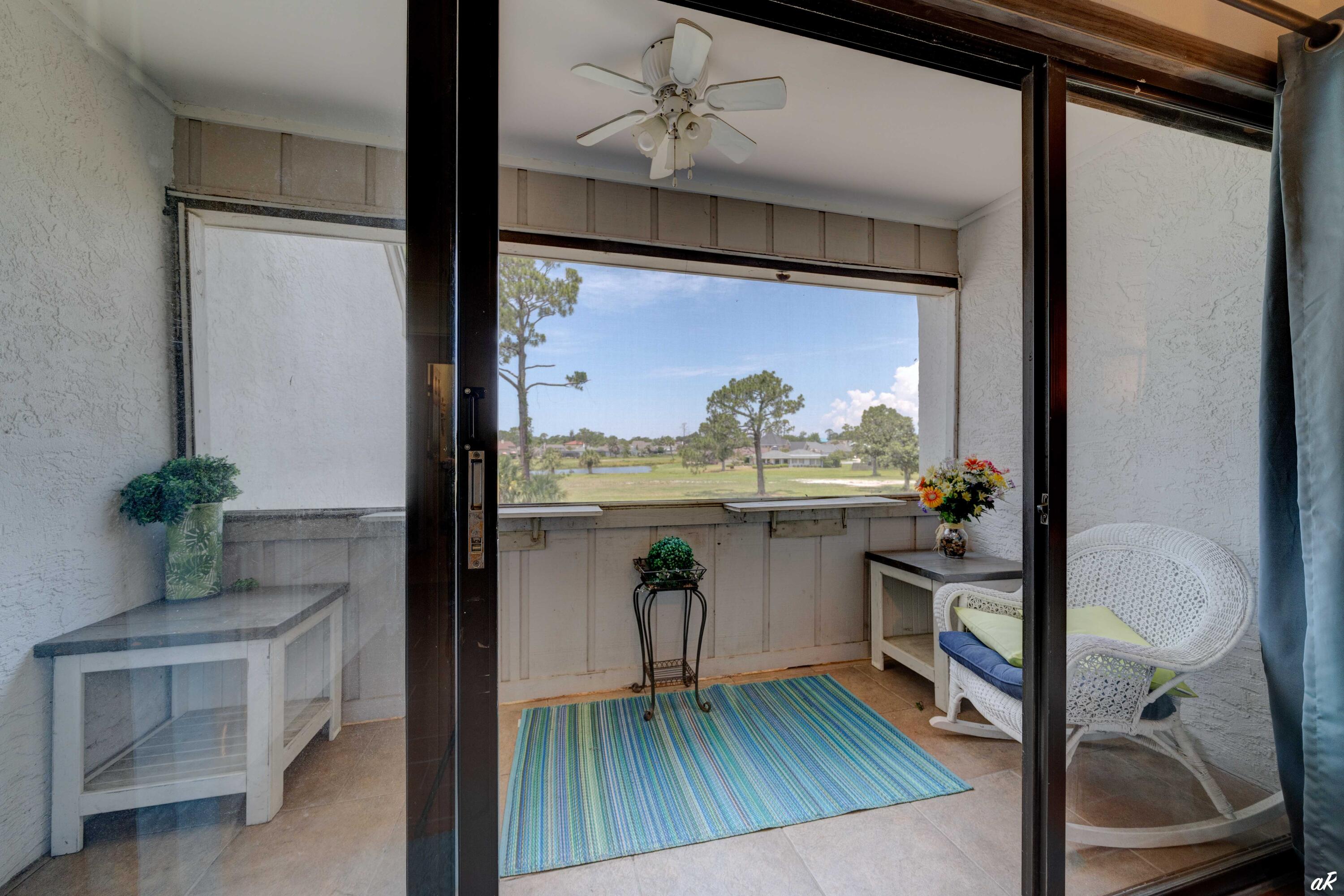 4300 Bay Point Road, Unit 417 Panama City Beach, FL 32408 - Photo 24 of 35 a view of living room with furniture and a potted plant