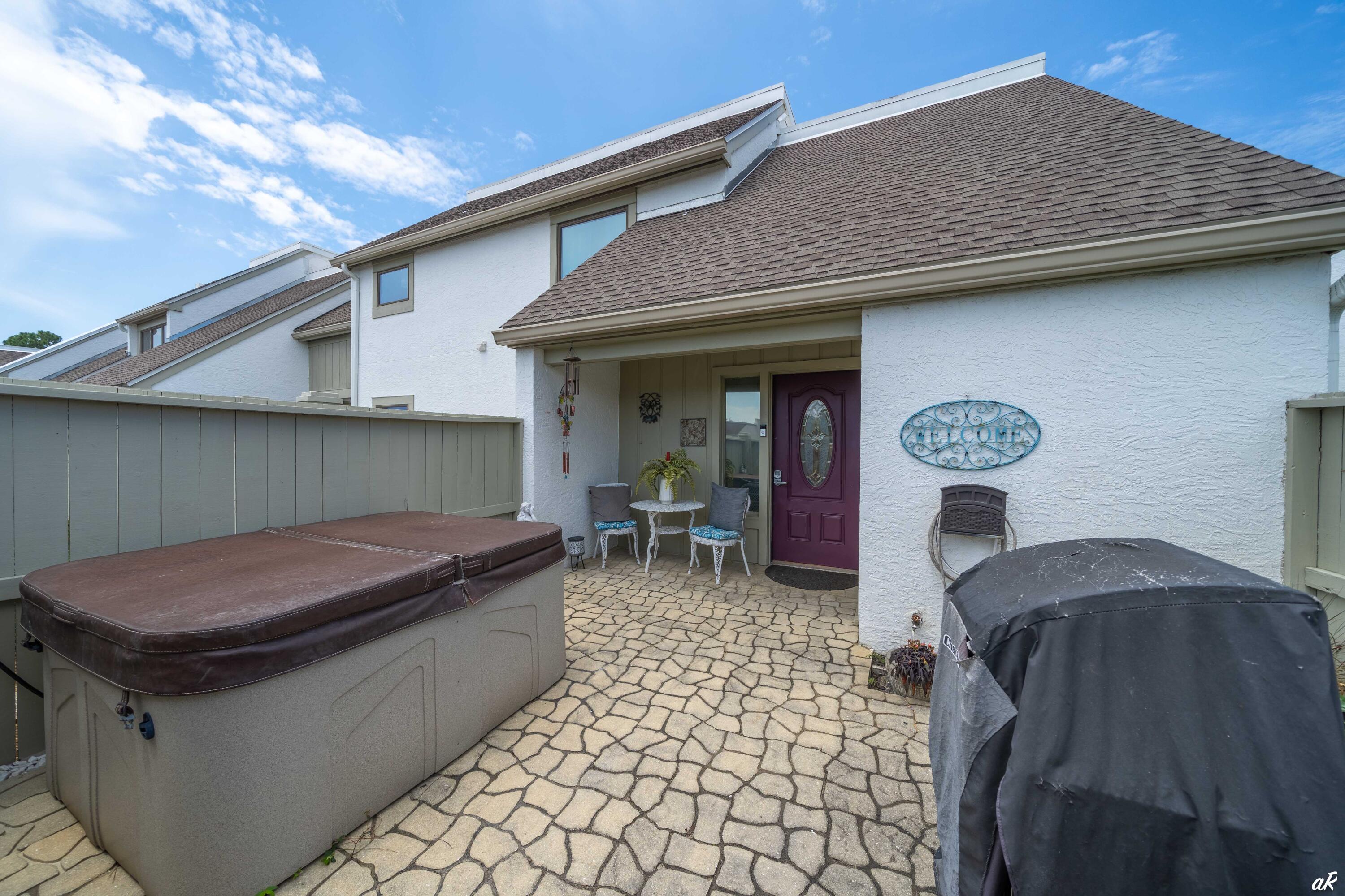 4300 Bay Point Road, Unit 417 Panama City Beach, FL 32408 - Photo 28 of 35 a house view with a outdoor space