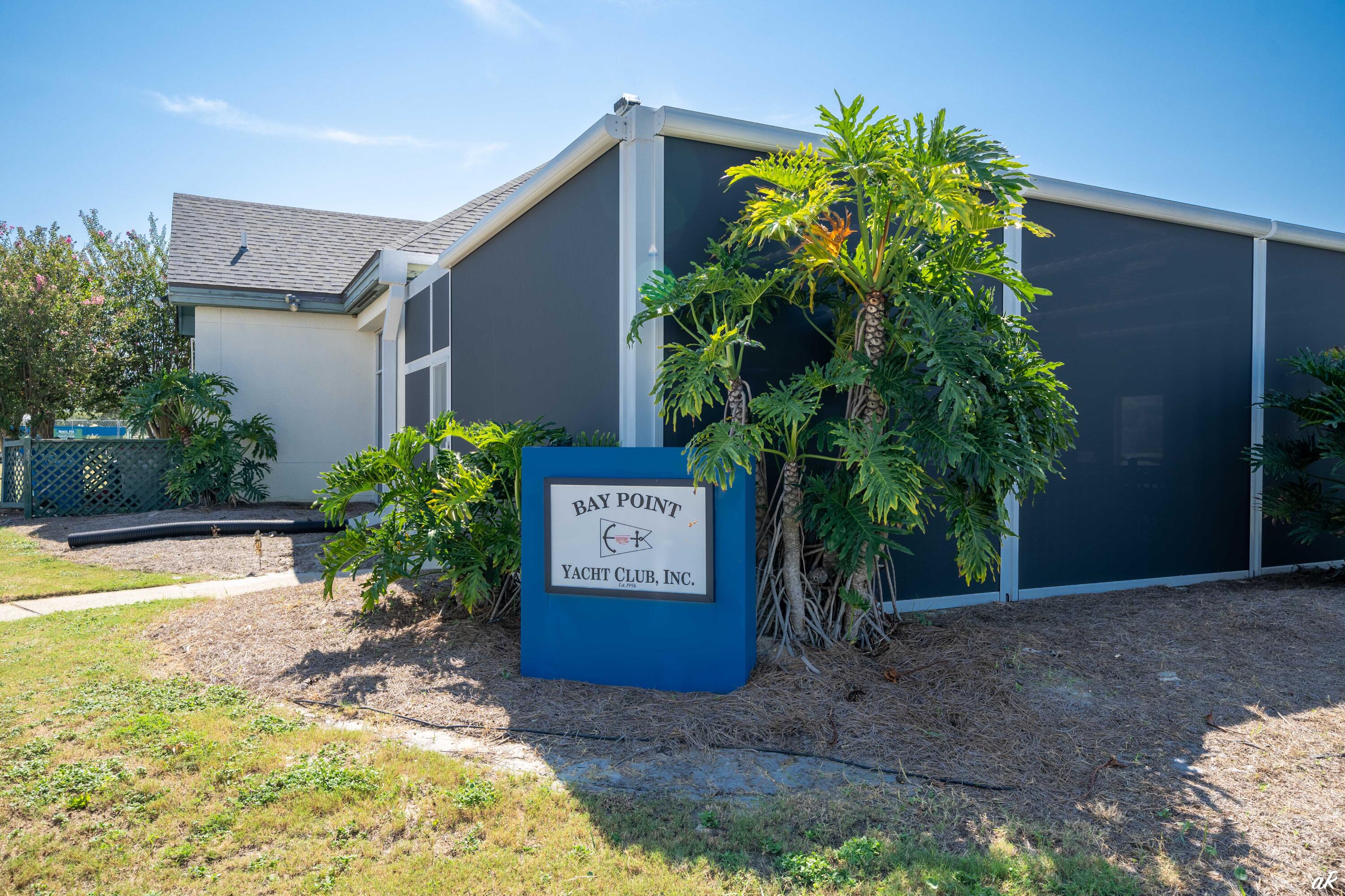 4300 Bay Point Road, Unit 417 Panama City Beach, FL 32408 - Photo 34 of 35 a view of a back yard with potted plants