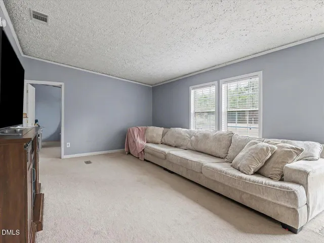 a kitchen with a sink and a window