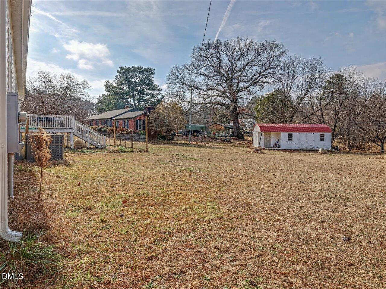523 County Line Road Manson, NC 27553 - Photo 40 of 70 a house with trees in front of it