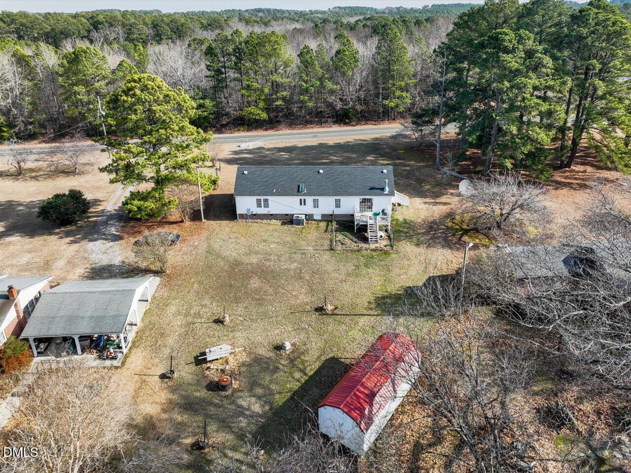 523 County Line Road Manson, NC 27553 - Photo 49 of 70 an aerial view of a house with a yard