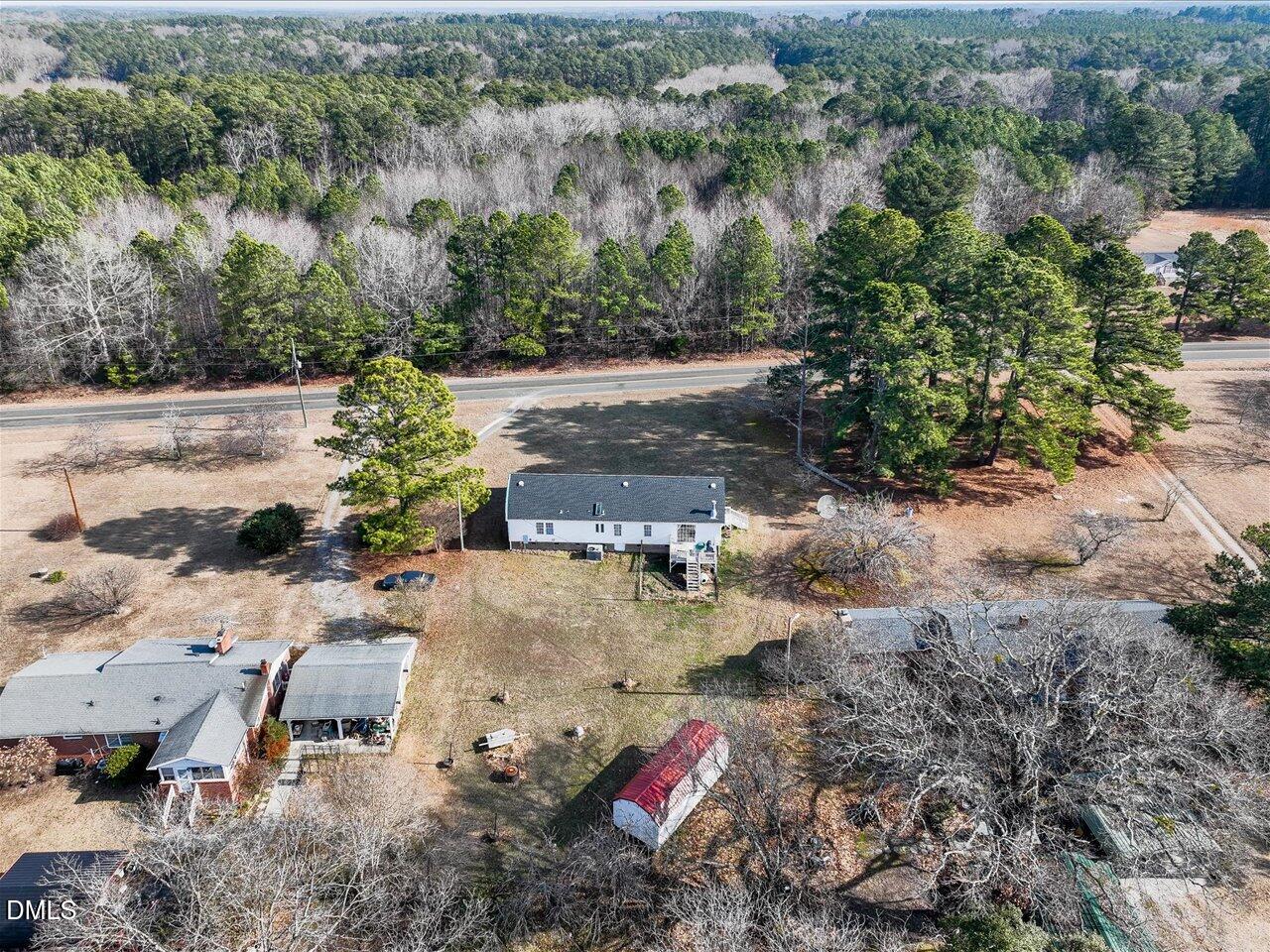 523 County Line Road Manson, NC 27553 - Photo 50 of 70 an aerial view of a houses with a yard
