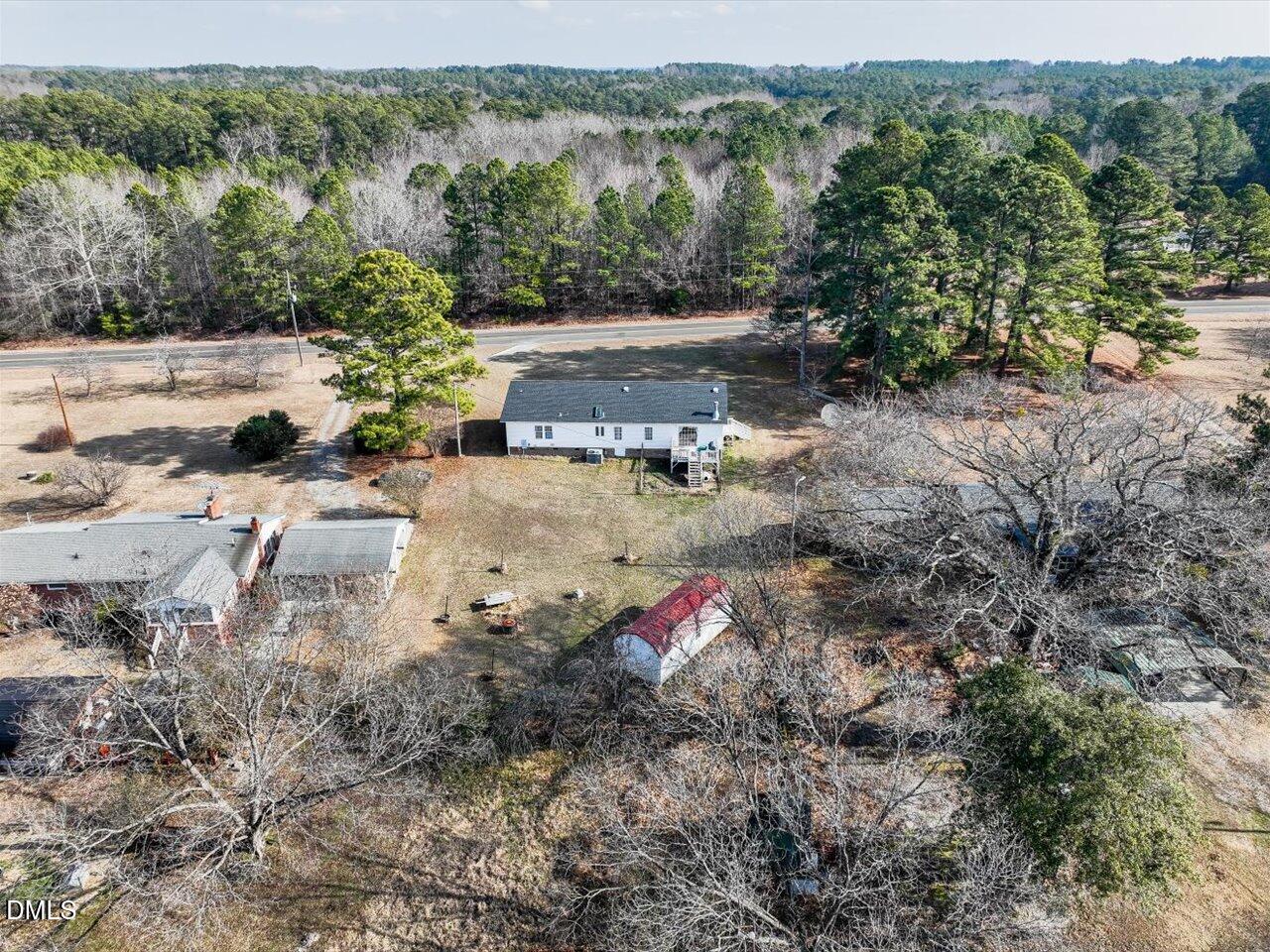 523 County Line Road Manson, NC 27553 - Photo 51 of 70 an aerial view of a house with a yard