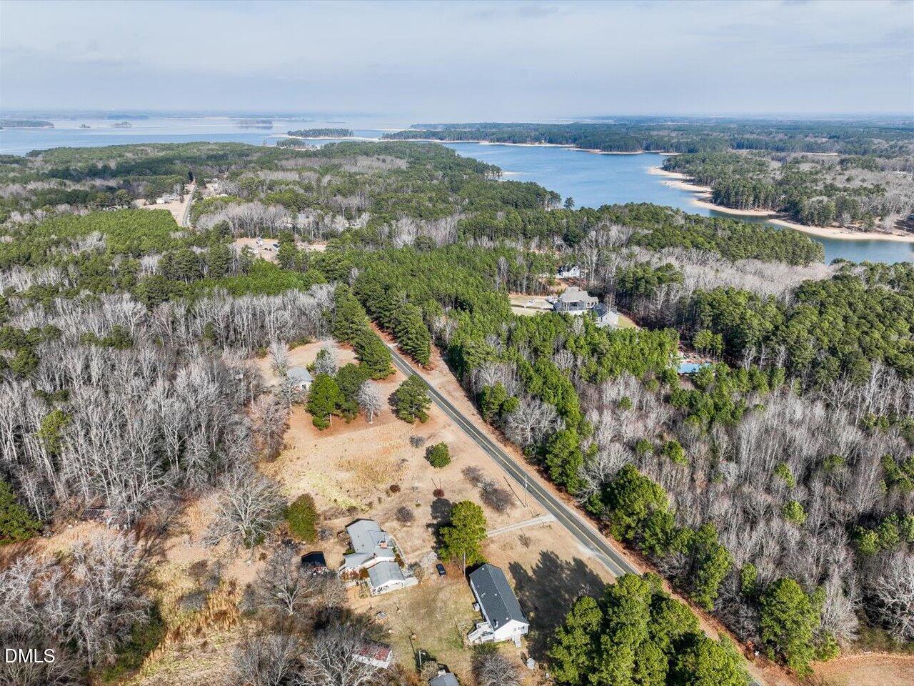 523 County Line Road Manson, NC 27553 - Photo 58 of 70 an aerial view of residential houses with outdoor space and trees