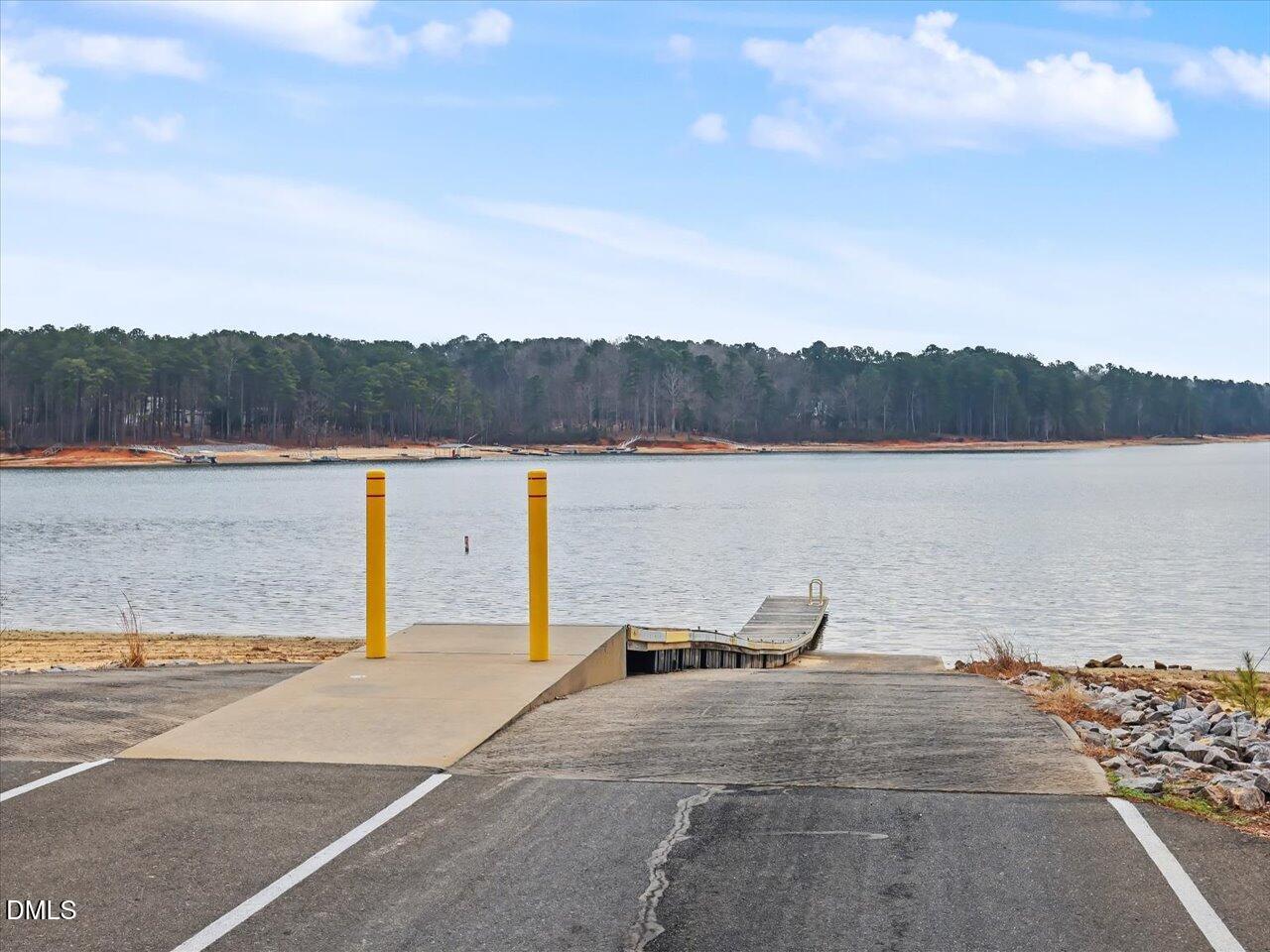 523 County Line Road Manson, NC 27553 - Photo 68 of 70 a view of a lake with a mountain