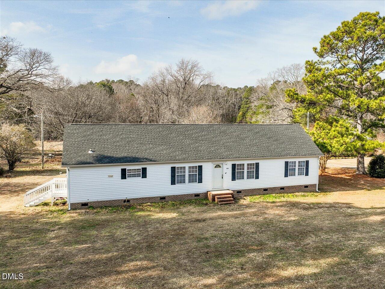 523 County Line Road Manson, NC 27553 - Photo 7 of 70 a front view of a house with a yard