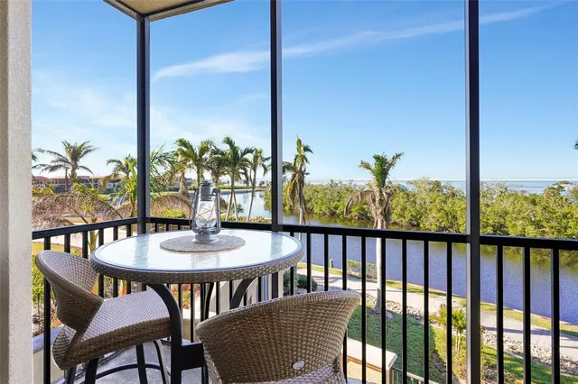 a living room with furniture a ceiling fan and a window