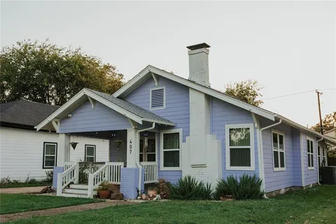 view of backyard with wooden fence