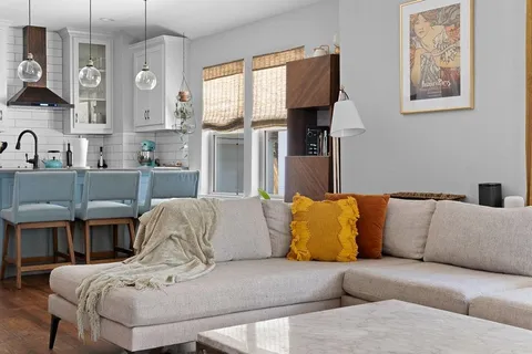 a living room with furniture and a couch