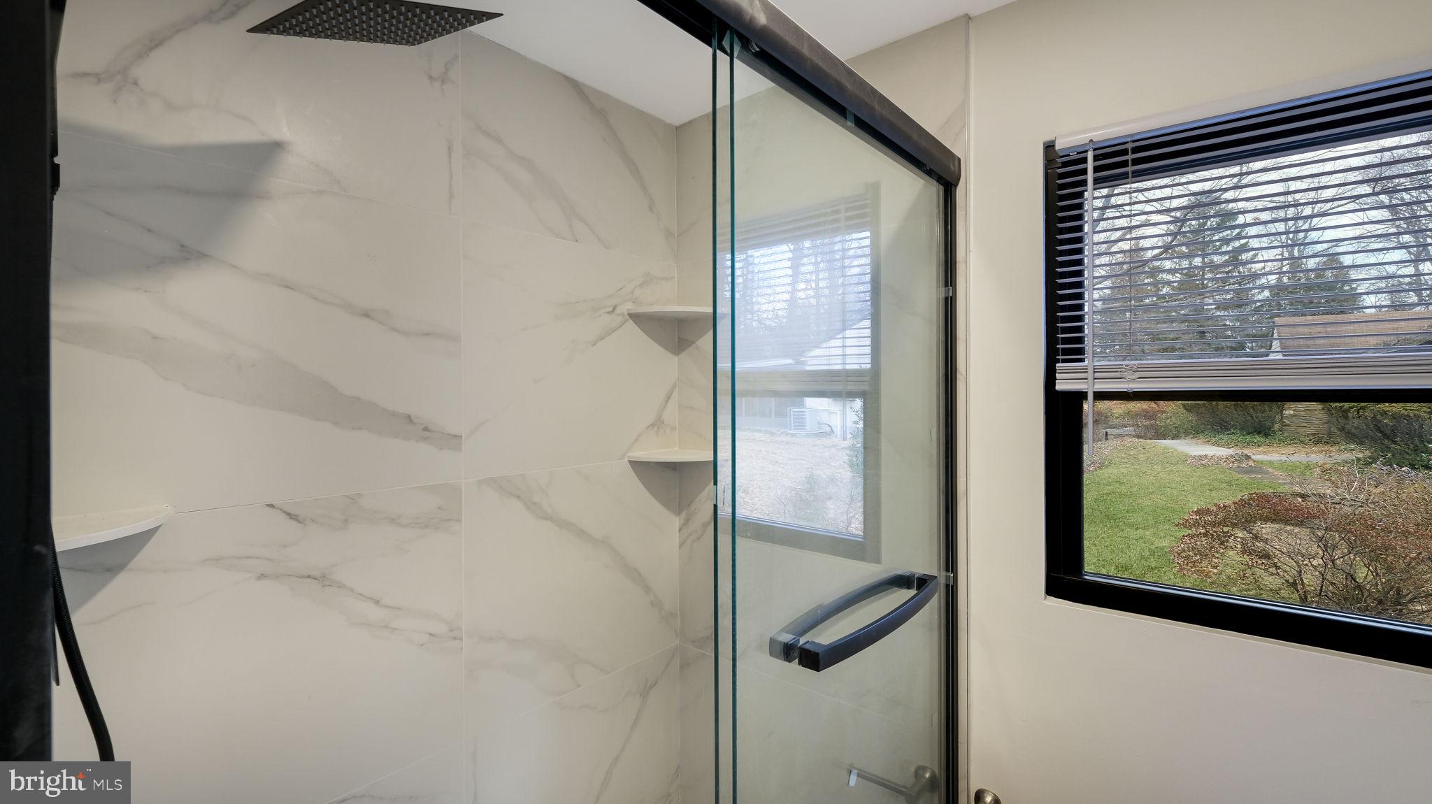 1617 Church Road Glenside, PA 19038 - Photo 24 of 39 Sleek shower with modern elegance.