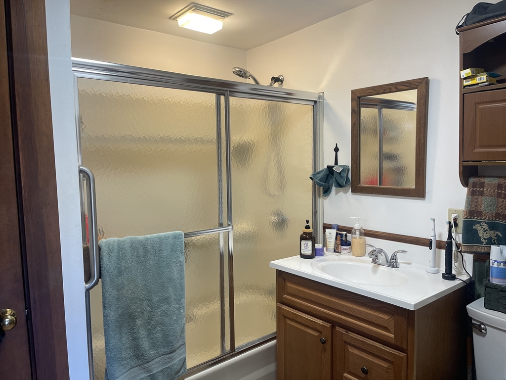295 Cherry Street Middleboro, MA 02346 - Photo 34 of 41 a bathroom with a sink and a mirror