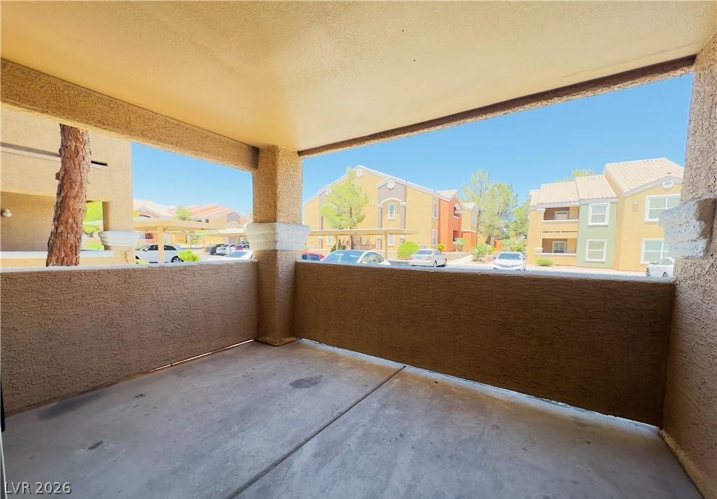 8101 West Flamingo Road, Unit 1082 Las Vegas, NV 89147 - Photo 14 of 23 A quiet covered patio provides an inviting outdoor retreat with community views.