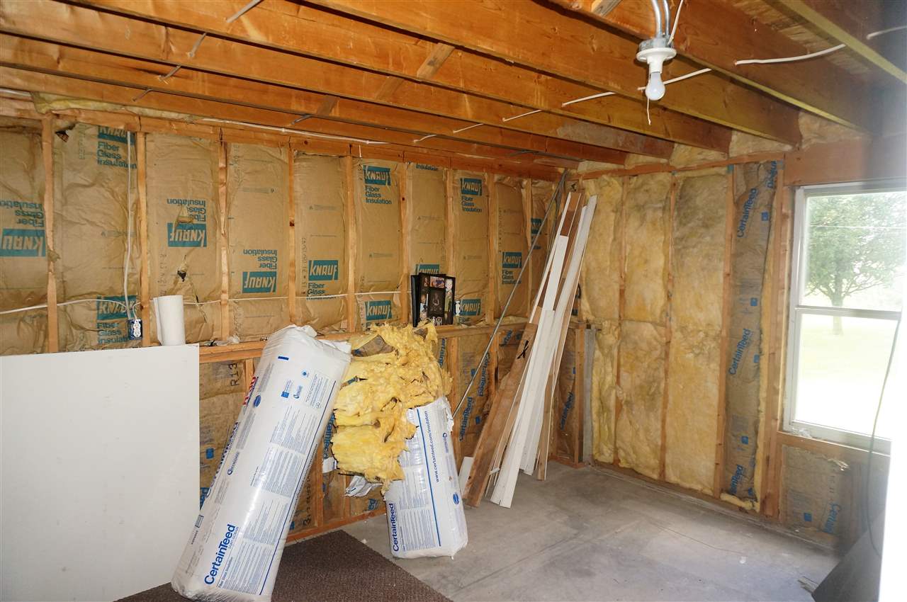 304 Rochester Road Northeast Poplar Grove, IL 61065 - Photo 20 of 23 a view of a bath room with furniture and a window