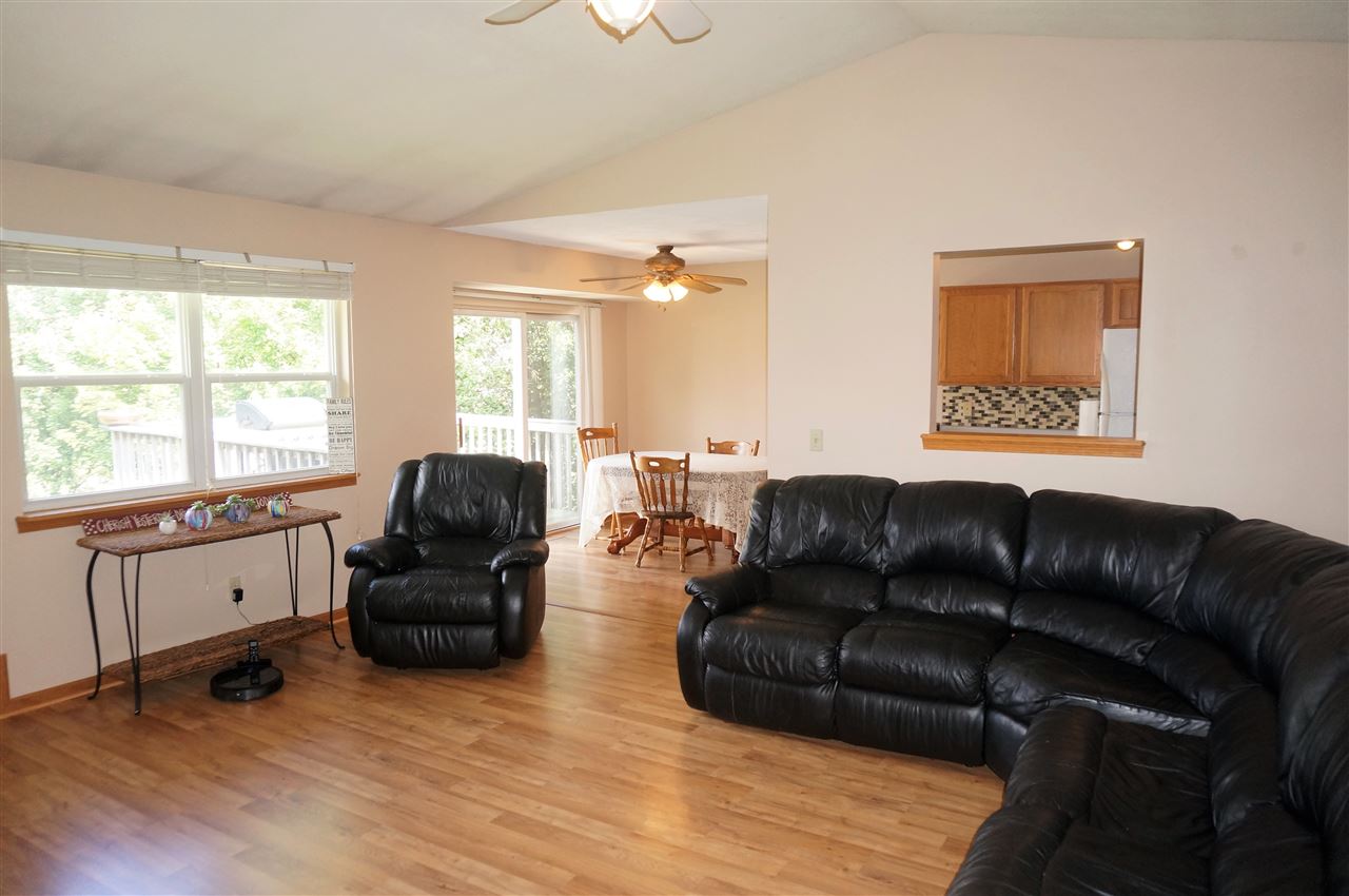 304 Rochester Road Northeast Poplar Grove, IL 61065 - Photo 5 of 23 a living room with furniture window and a wooden floor