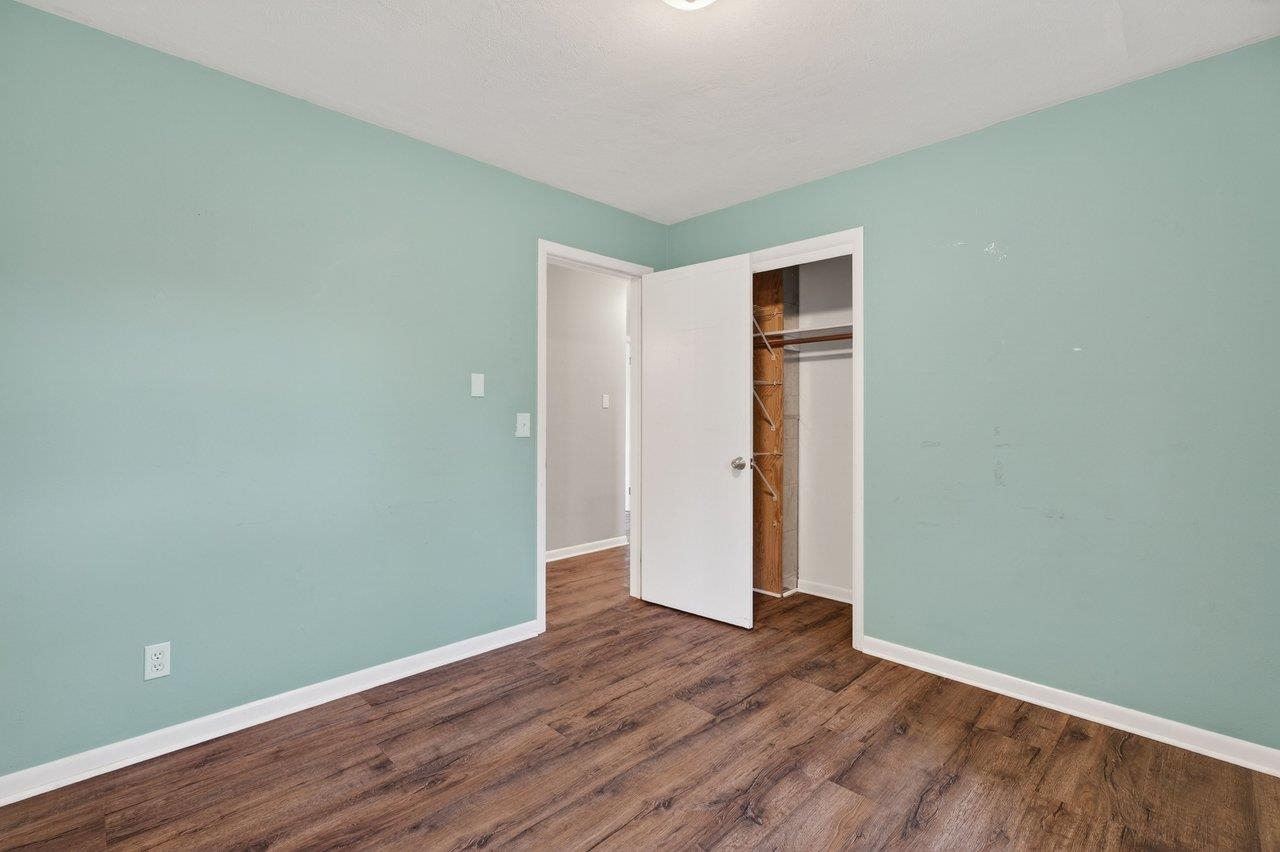 3259 Zion Church Road Broadway, VA 22815 - Photo 19 of 48 a view of an empty room with wooden floor