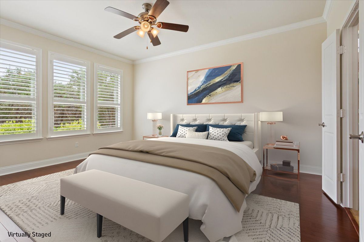 905 Mount Locke Court Georgetown, TX 78633 - Photo 18 of 36 a bedroom with a bed and a painting on the wall