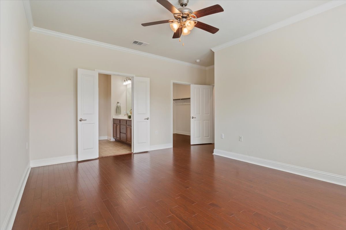 905 Mount Locke Court Georgetown, TX 78633 - Photo 20 of 36 a view of an empty room and wooden floor
