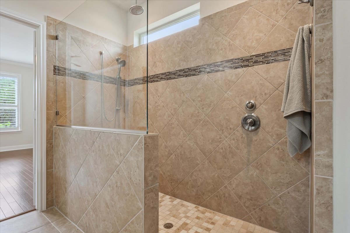 905 Mount Locke Court Georgetown, TX 78633 - Photo 23 of 36 a bathroom with a shower