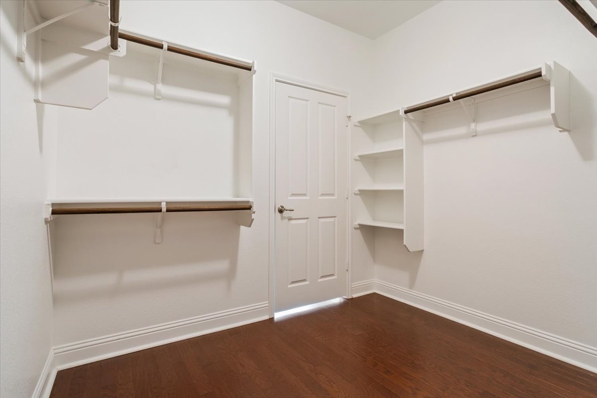 905 Mount Locke Court Georgetown, TX 78633 - Photo 24 of 36 a view of an empty walk in closet