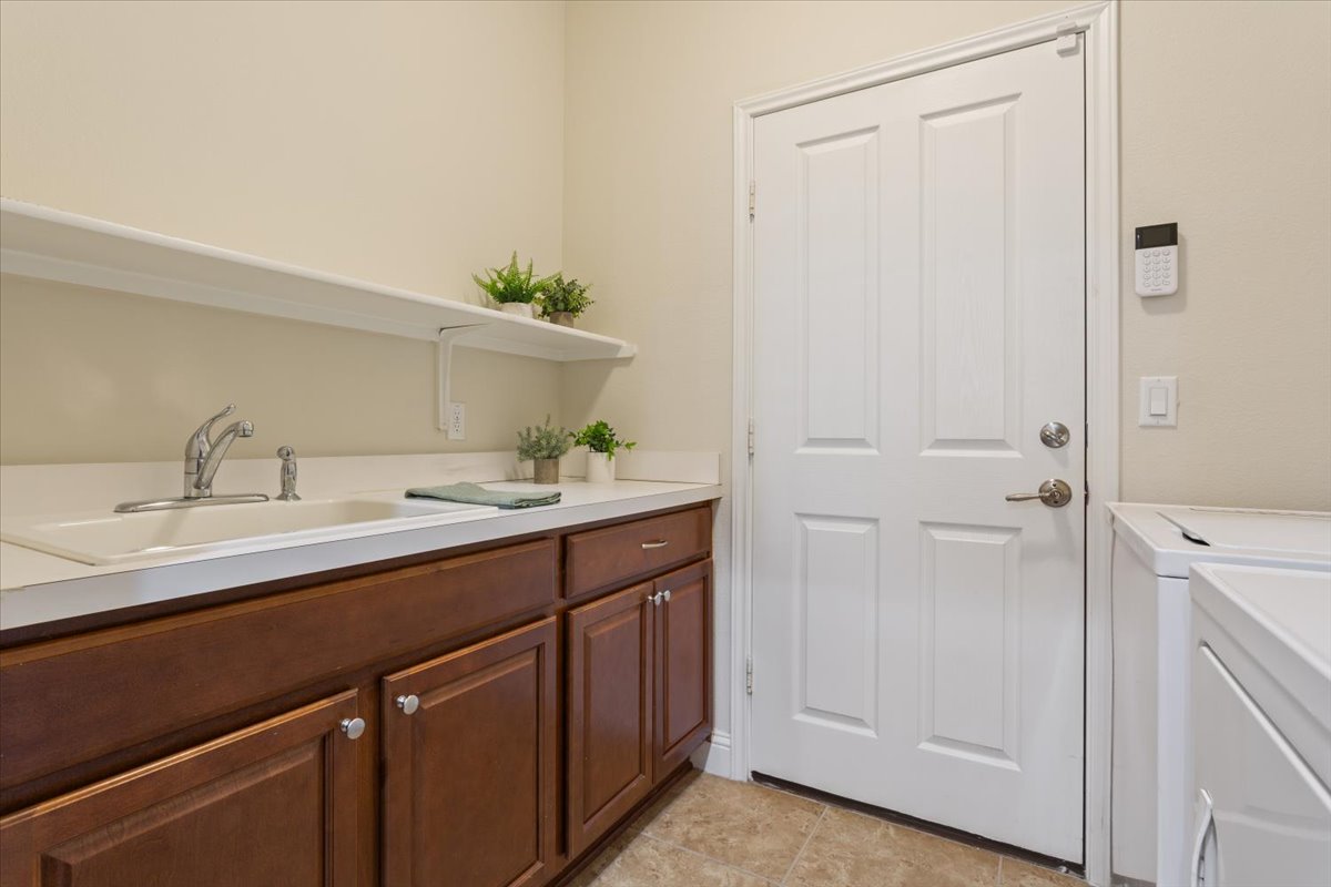905 Mount Locke Court Georgetown, TX 78633 - Photo 29 of 36 a bathroom with a sink and a mirror