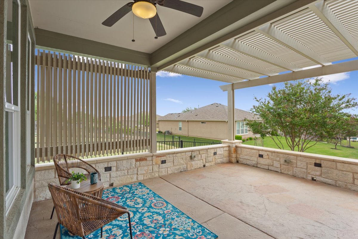 905 Mount Locke Court Georgetown, TX 78633 - Photo 31 of 36 a view of a chairs and table in the balcony