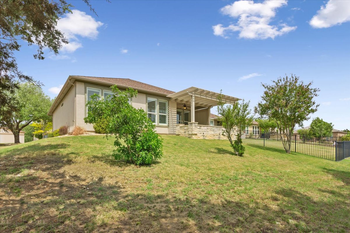 905 Mount Locke Court Georgetown, TX 78633 - Photo 34 of 36 a view of a house with a backyard