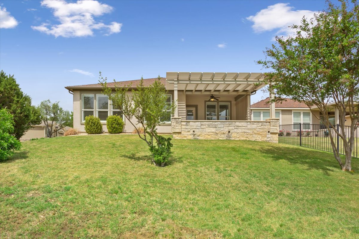 905 Mount Locke Court Georgetown, TX 78633 - Photo 35 of 36 a view of a house with a yard
