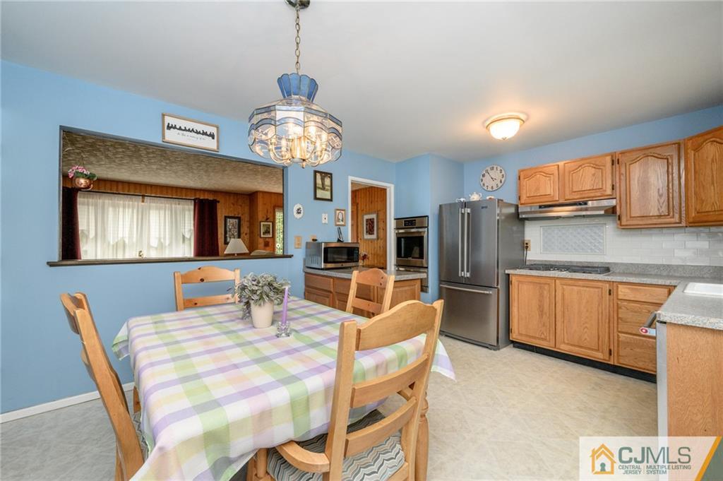 25 Drexel Drive Jackson, NJ 08527 - Photo 11 of 34 a view of a dining room with furniture