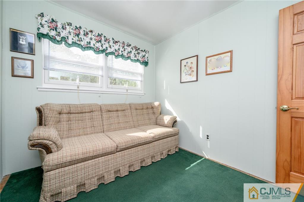 25 Drexel Drive Jackson, NJ 08527 - Photo 18 of 34 a living room with furniture and a window
