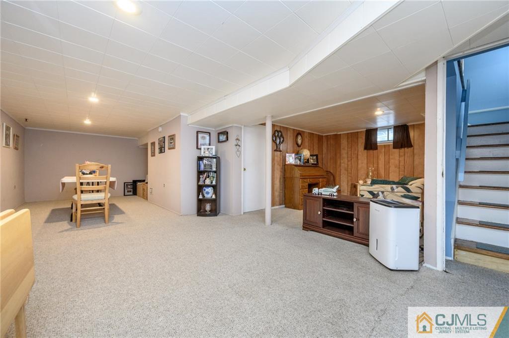 25 Drexel Drive Jackson, NJ 08527 - Photo 26 of 34 a view of a livingroom with furniture and a kitchen