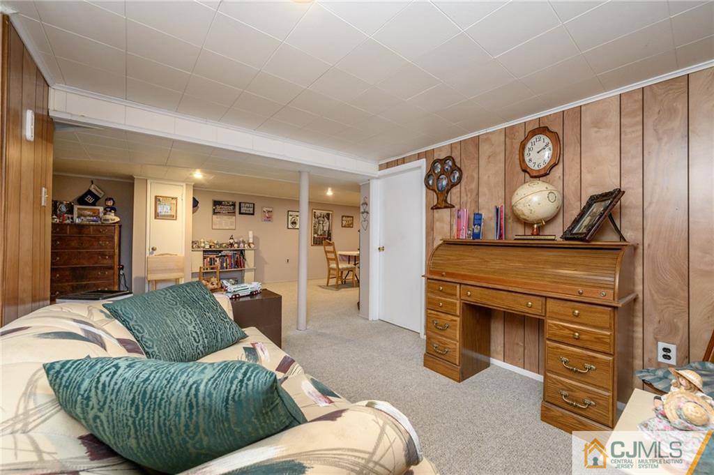 25 Drexel Drive Jackson, NJ 08527 - Photo 29 of 34 a living room with furniture and wooden floor