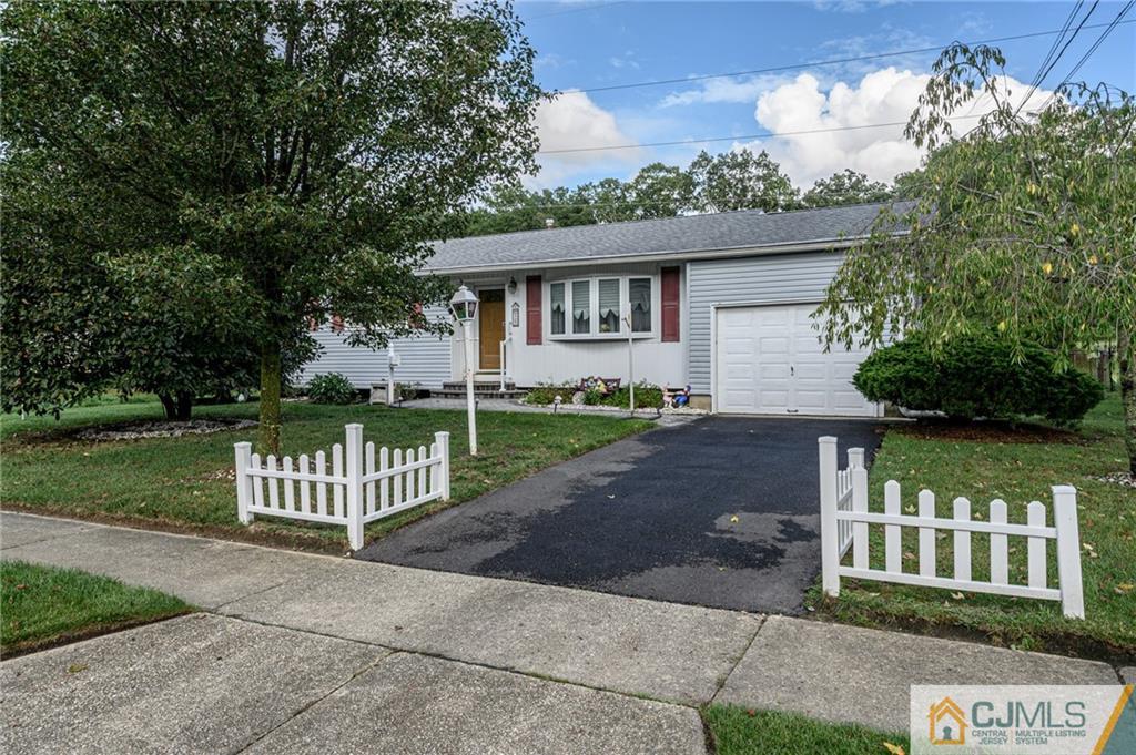 25 Drexel Drive Jackson, NJ 08527 - Photo 34 of 34 a front view of a house with garden