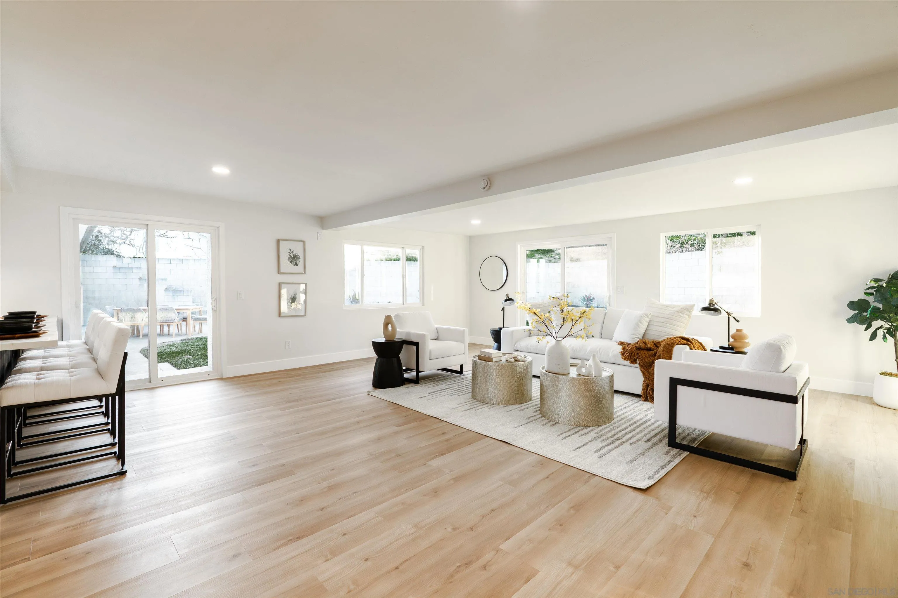 4112 Lois Street La Mesa, CA 91941 - Photo 14 of 39 a living room with furniture and a wooden floor