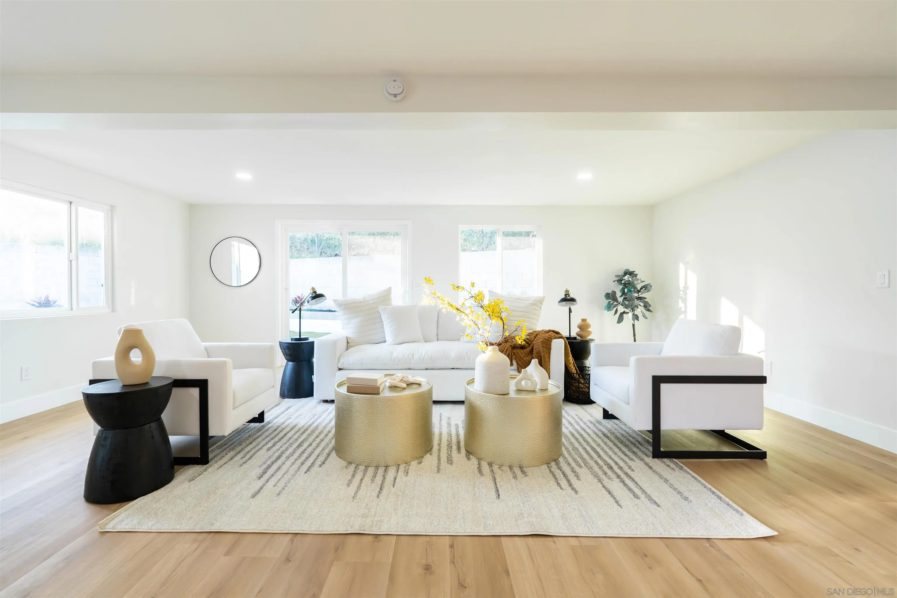 4112 Lois Street La Mesa, CA 91941 - Photo 16 of 39 a living room with furniture and wooden floor