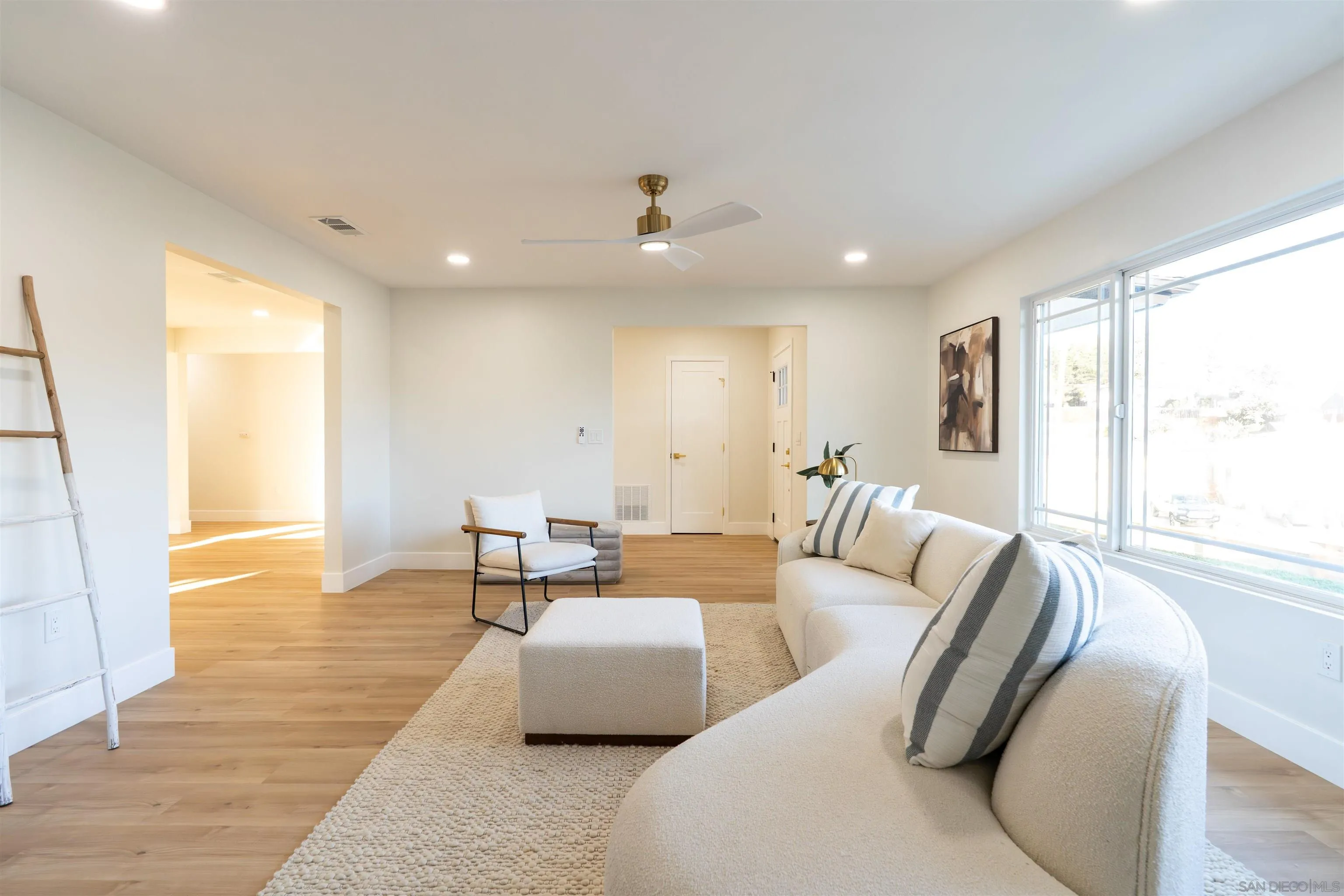 4112 Lois Street La Mesa, CA 91941 - Photo 17 of 39 a living room with furniture and a large window