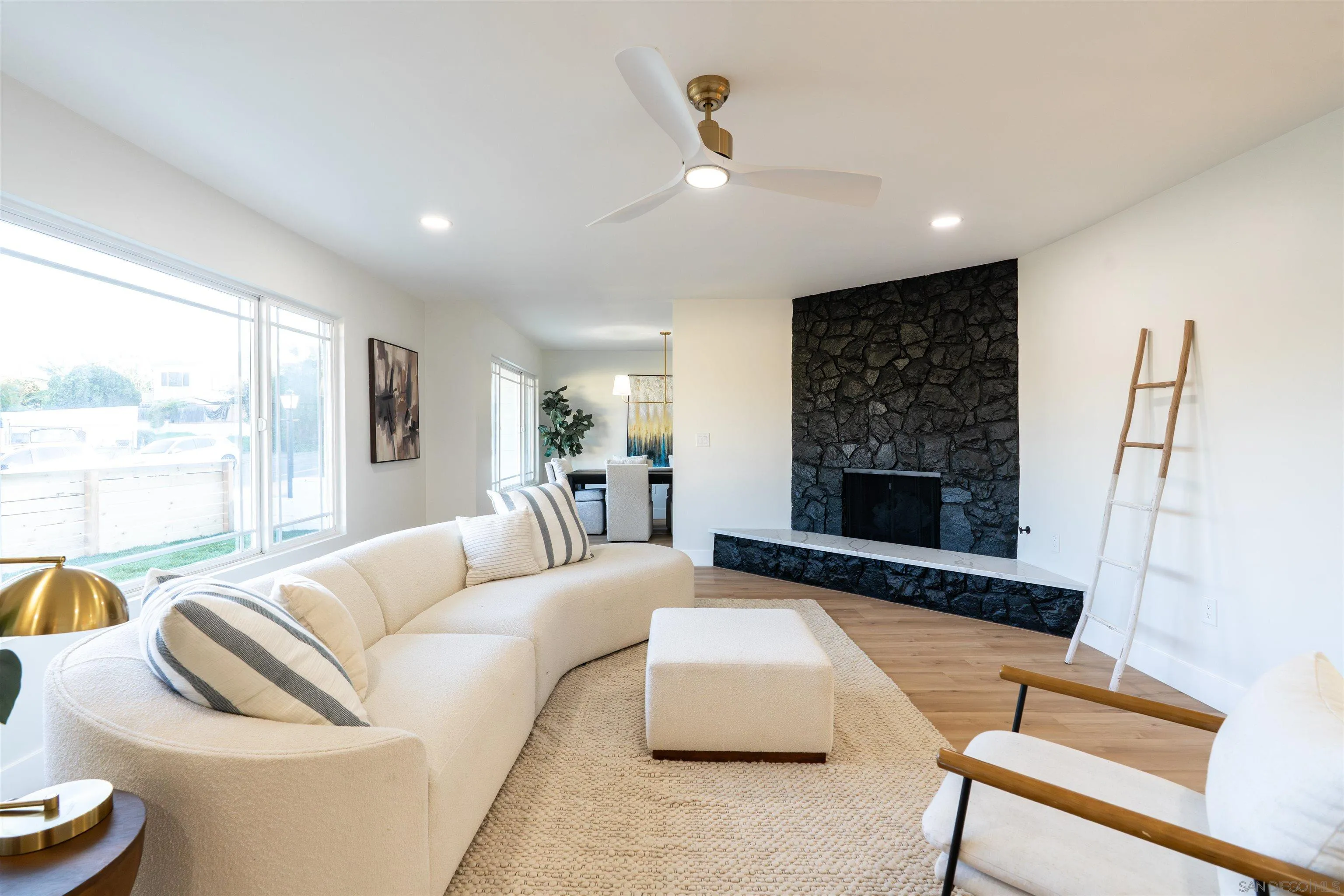 4112 Lois Street La Mesa, CA 91941 - Photo 19 of 39 a living room with furniture and a fireplace