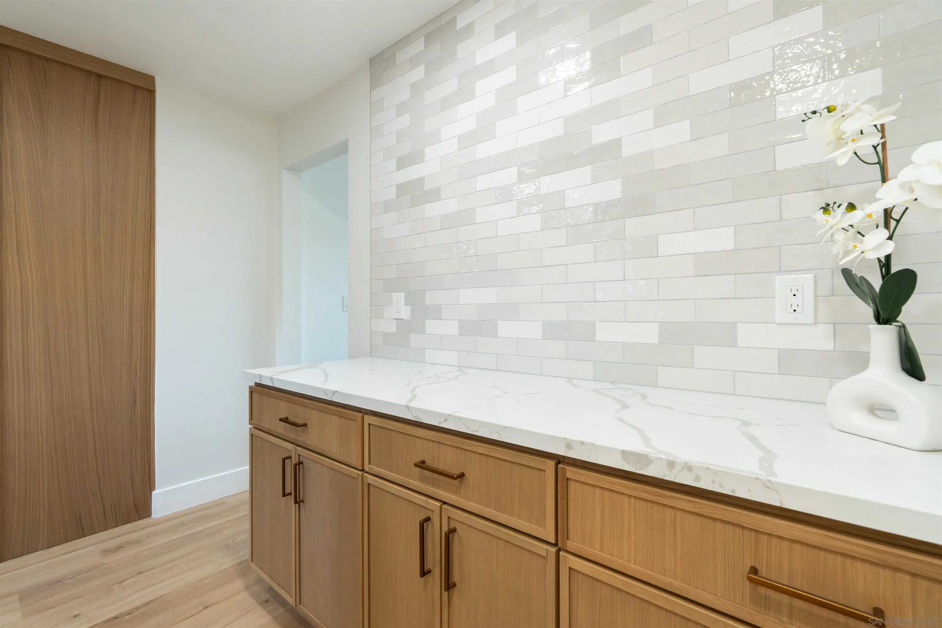 4112 Lois Street La Mesa, CA 91941 - Photo 21 of 39 a bathroom with a granite countertop sink and vanity