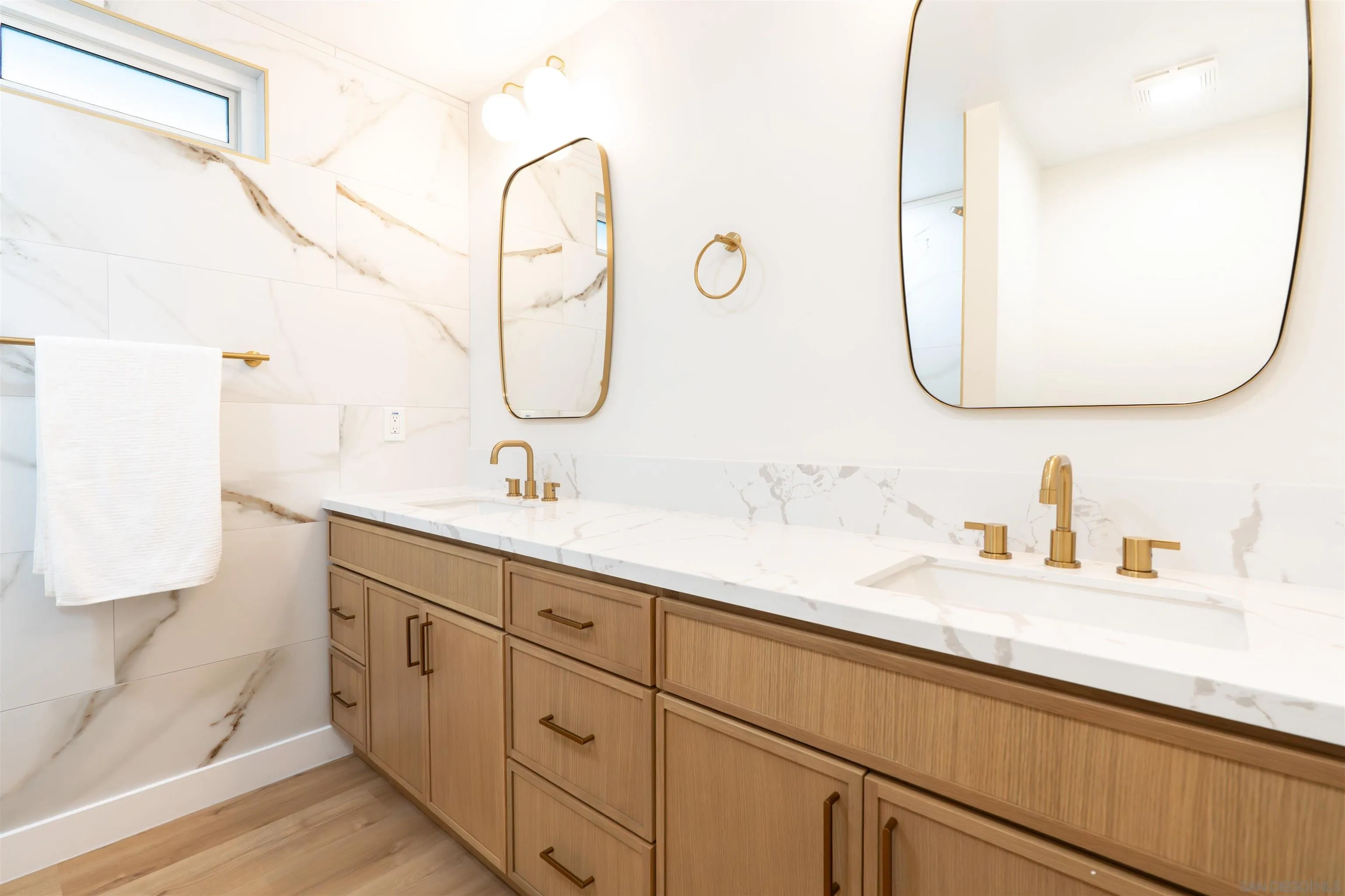 4112 Lois Street La Mesa, CA 91941 - Photo 27 of 39 a bathroom with a sink and a mirror