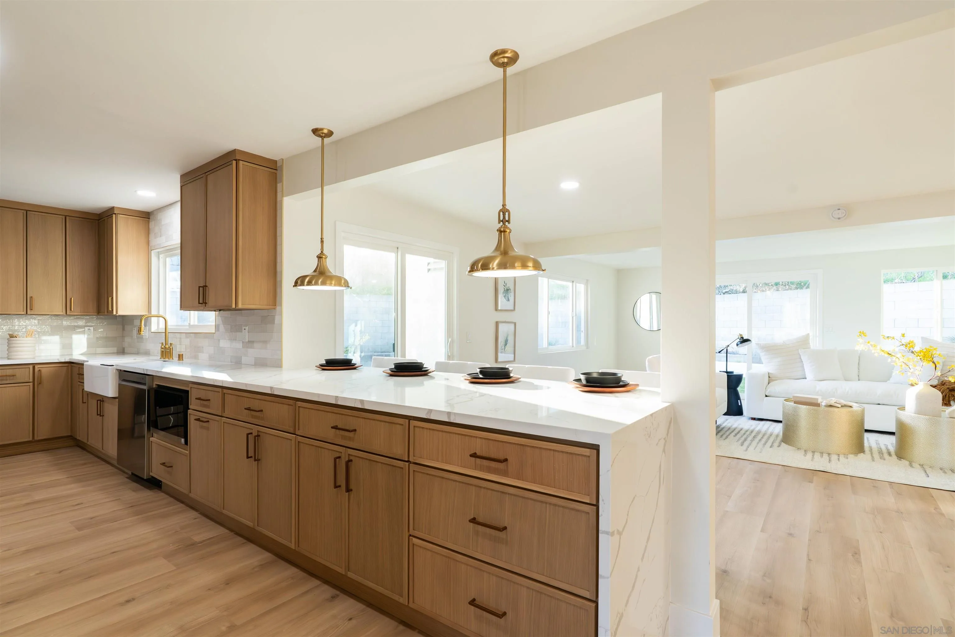 4112 Lois Street La Mesa, CA 91941 - Photo 6 of 39 a kitchen with a sink and cabinets