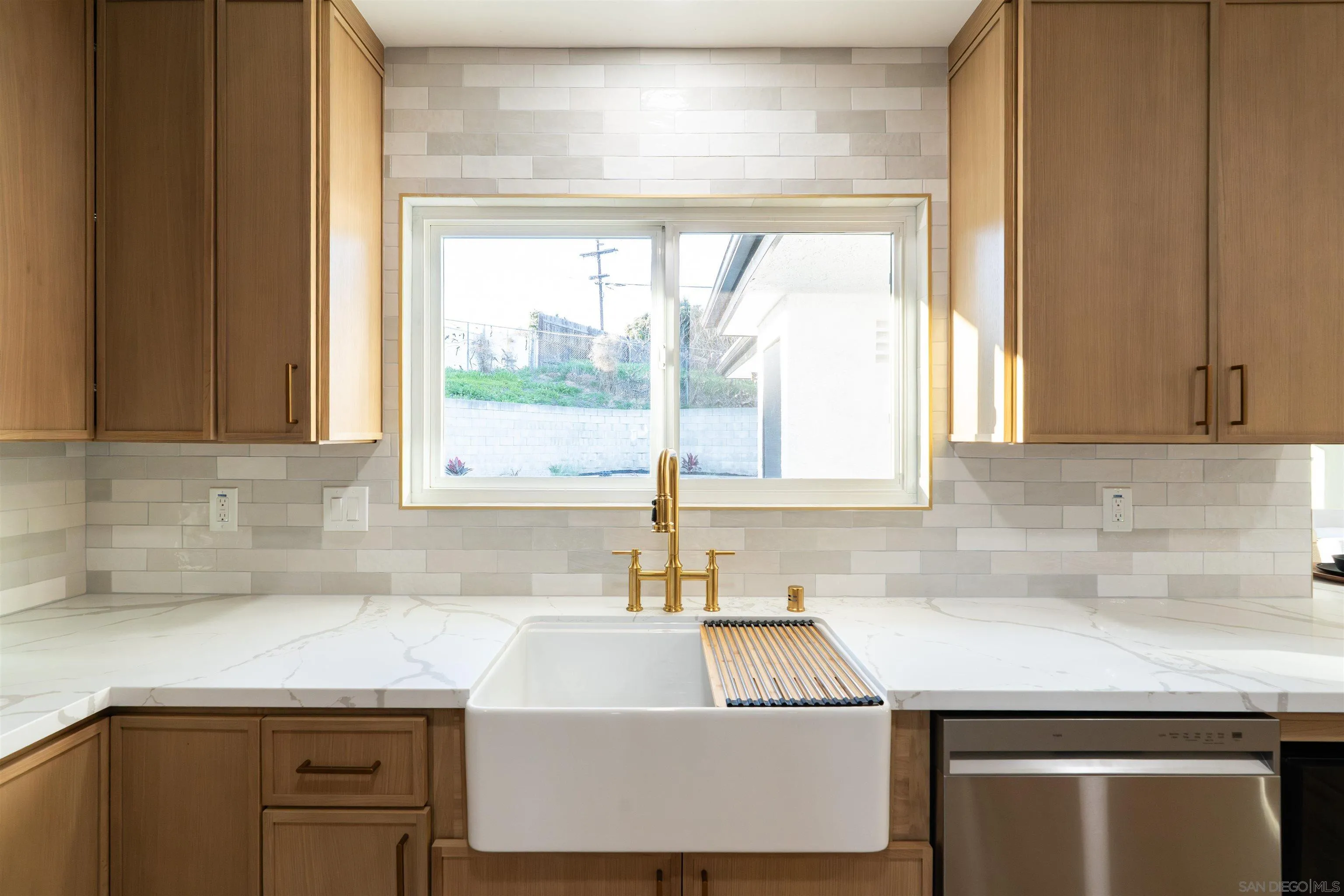 4112 Lois Street La Mesa, CA 91941 - Photo 10 of 39 a kitchen with a sink and a window