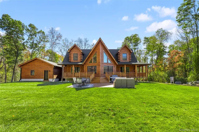 a view of a field with a mountain in the background