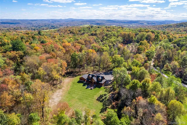 a kitchen with stainless steel appliances granite countertop a stove and cabinets