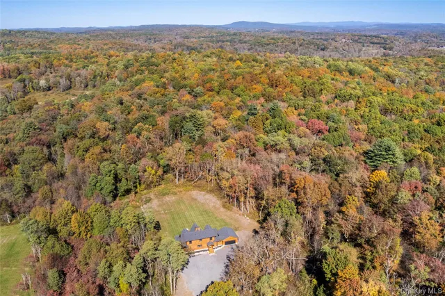 a picture of a bench in front of a building
