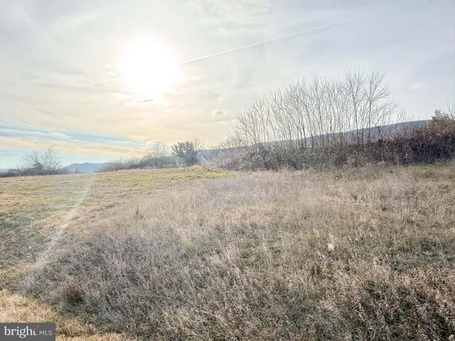 a view of lake and mountain