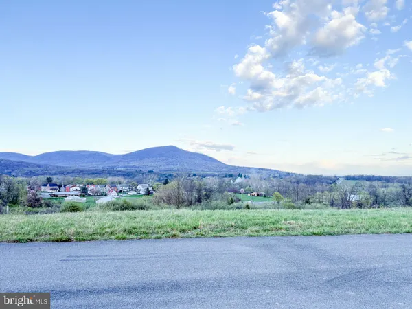 a view of an outdoor space and mountain view