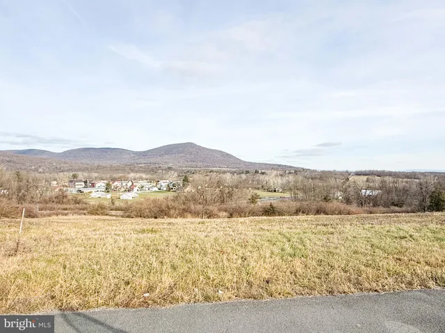 a view of a swimming pool and an ocean