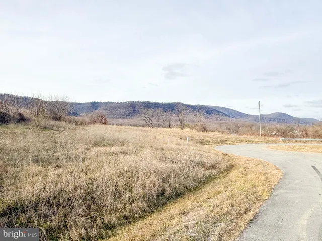 a view of a lake and mountain
