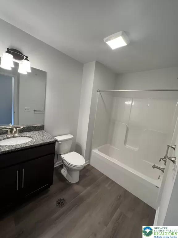 1047 Cetronia Road, Unit 3 Breinigsville, PA 18031 - Photo 13 of 19 a bathroom with a sink a toilet and a bathtub