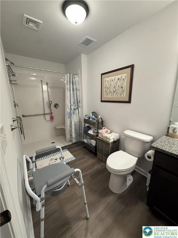 1047 Cetronia Road, Unit 3 Breinigsville, PA 18031 - Photo 15 of 19 a bathroom with a toilet sink and mirror